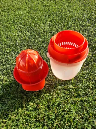 Espremedor Tupperware vermelho e Transparente