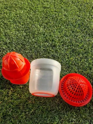 Espremedor Tupperware vermelho e Transparente