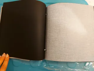 Álbum de fotos Hema con hojas de pergamino