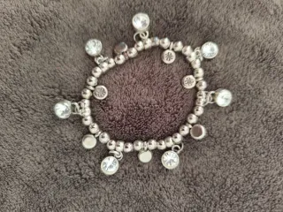 Conjunto 3 pulseras plata con dijes