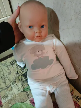 Muñeco bebé ojos azules