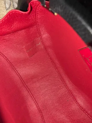 Bolso Christian Louboutin tachuelas negro/dorado