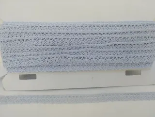 Punta de encaje de bolillos celeste