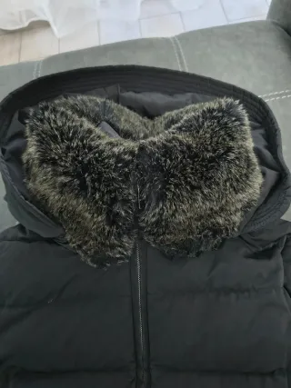 Piumino Dekker nero con cappuccio