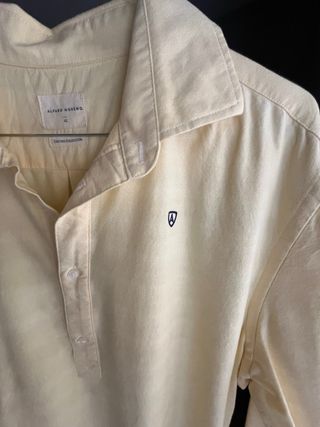 Camisa polera amarilla manga larga  Talla M-L