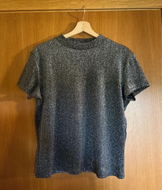 Maglietta glitterata nera e argento