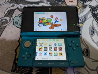 Nintendo 3DS Aqua + Cargador + microSD 32GB