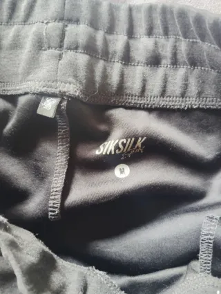 Pantalón chándal SIK SILK gris