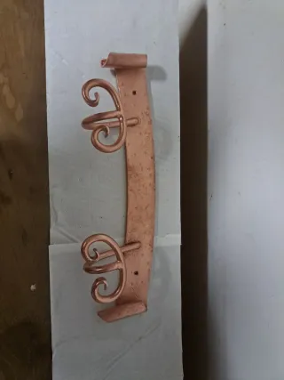 Perchero de hierro forjado dorado