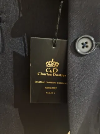 Traje azul americana y pantalón