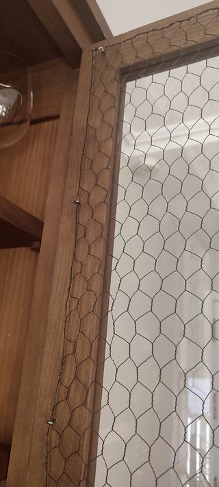 Vitrina de madera y cristal