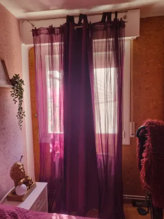 4Cortinas 3 de color moradas y un color cafe