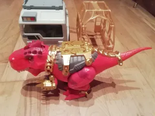 Camión y dinosaurio de juguete