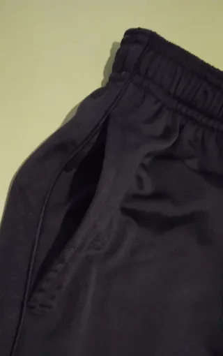 Pantalón de deporte largo bolsillos negro Talla S