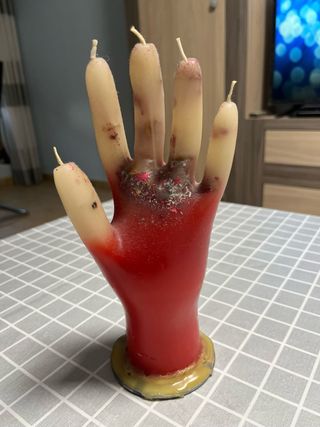 Vela mano decorativa roja y dorada