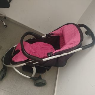 Cochecito de bebé rosa y negro