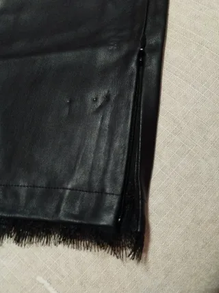 Conjunto Zara pantalón polipiel y suéter Cortefiel