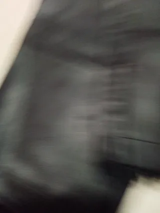 Conjunto Zara pantalón polipiel y suéter Cortefiel