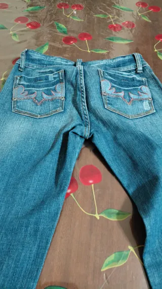 Jeans ragazza blu con dettagli viola