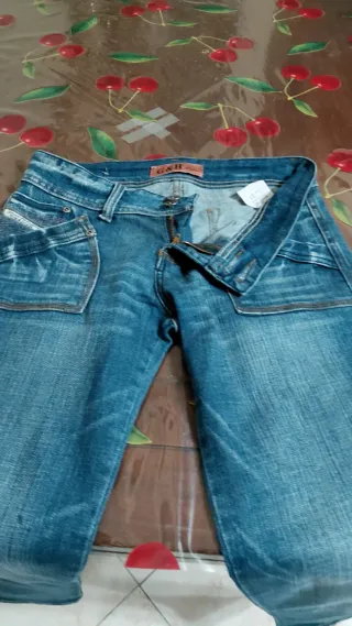 Jeans ragazza blu con dettagli viola