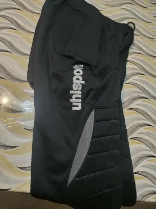 Pantalones portero Uhlsport negros y grises