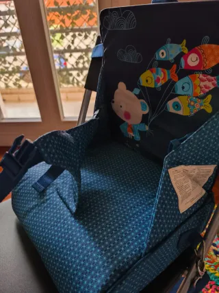 Trona infantil portable/bandolera Tuc Tuc