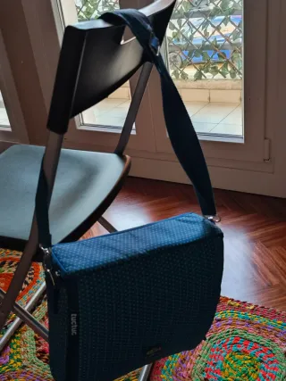 Trona infantil portable/bandolera Tuc Tuc