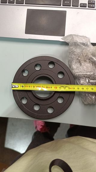 Espaciador o separador e rueda