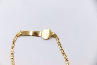 ESCLAVA DE NIÑO MEDUSA Y GRECA. Oro 18k.