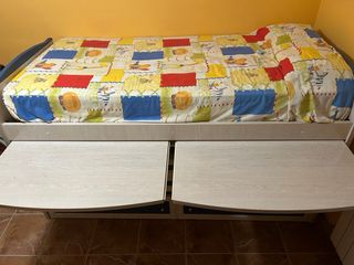 Cama alta con armarios y cajones