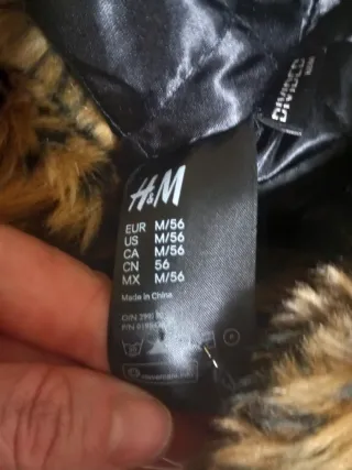 Cappello con pelliccia leopardata