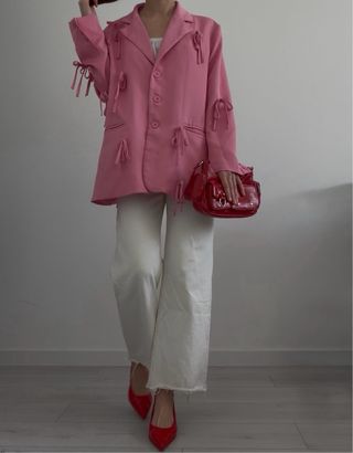 Blazer rosa con lazos
