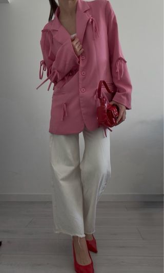 Blazer rosa con lazos