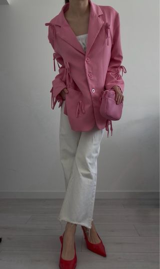 Blazer rosa con lazos