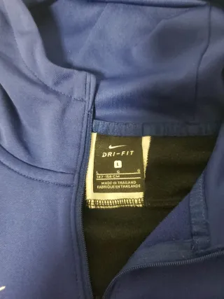 Conjunto deportivo Nike azul y negro