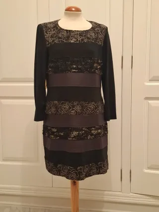 Vestido negro y dorado con detalles