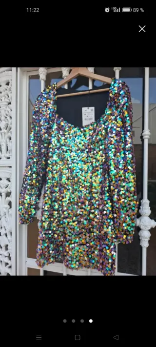 Vestido lentejuelas elástico.Manga larga abullonad