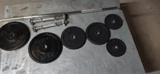 Barra y discos de pesas