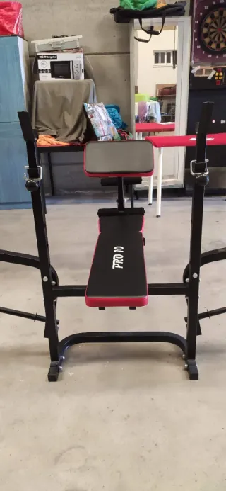 Barra y discos de pesas