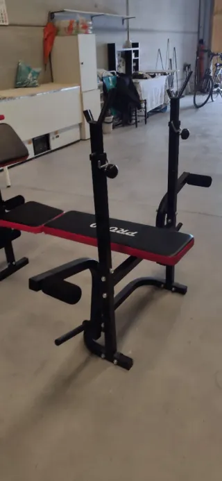 Barra y discos de pesas