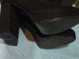 Botas altas negras con plataforma y tacón