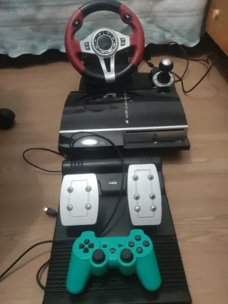 Consola PlayStation 3 con mando y volante+pedales