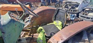 Tractor con pala John Deere 515.