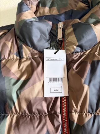 Plumas Purificación García camuflaje