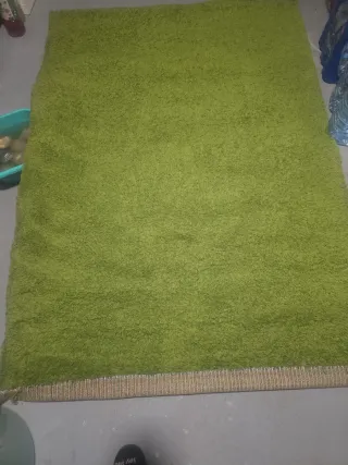 Alfombra verde de tela