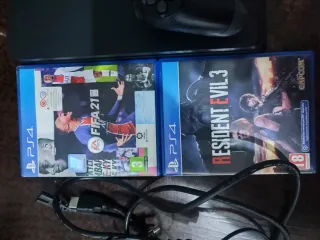 PS4 Slim Negra + 2 Mando Blanco y negro +2 Juegos