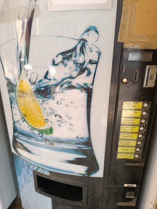 Latero Vendo y expendedora Wurlitzer 1000