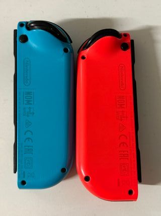 Nintendo Switch soporte y mandos azul y rosa