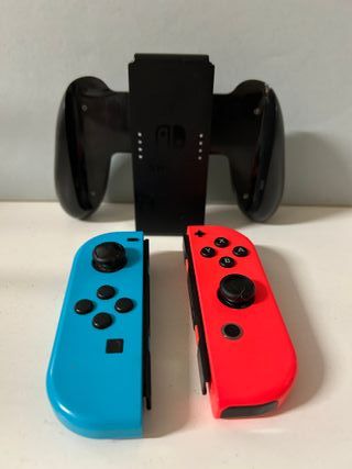 Nintendo Switch soporte y mandos azul y rosa