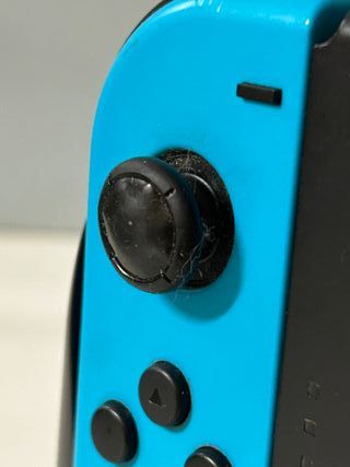 Nintendo Switch soporte y mandos azul y rosa